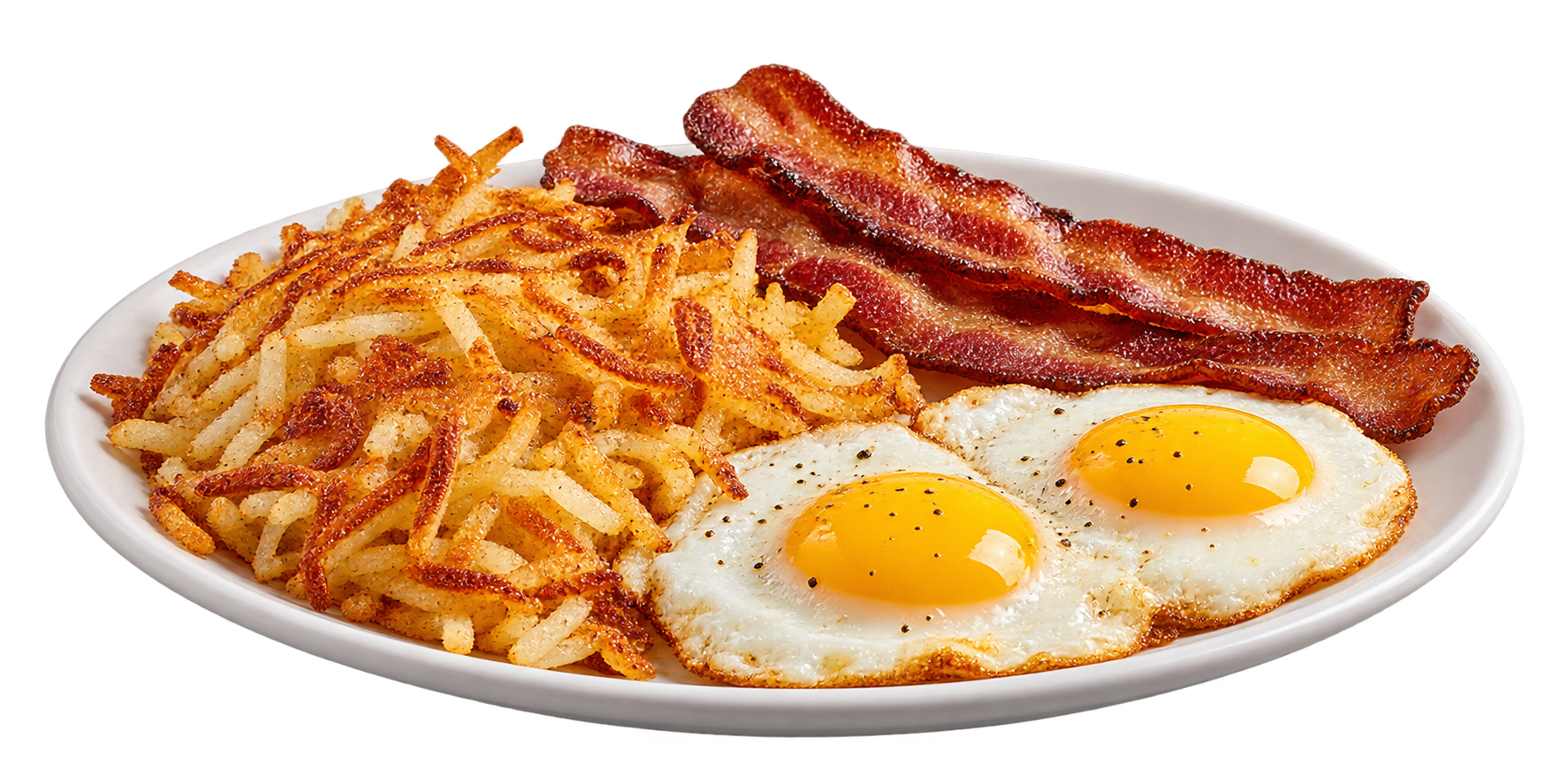 Shredded hash browns, bacon and sunny-side-up eggs on a plate